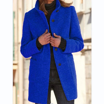 Stylish wool coat with stand collar, pockets, and slim fit design for casual winter wear.