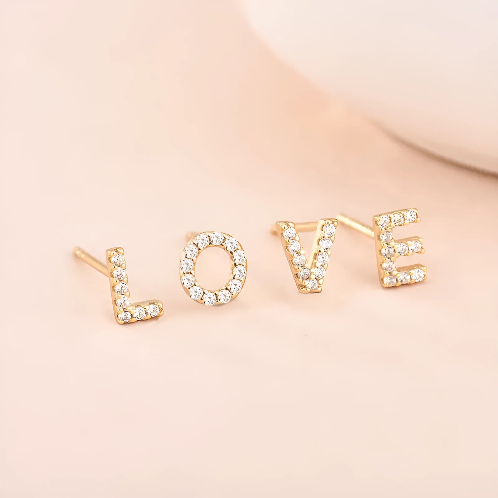 Brass gold plated alphabet letter earrings with zircon accents showing A-Z character options