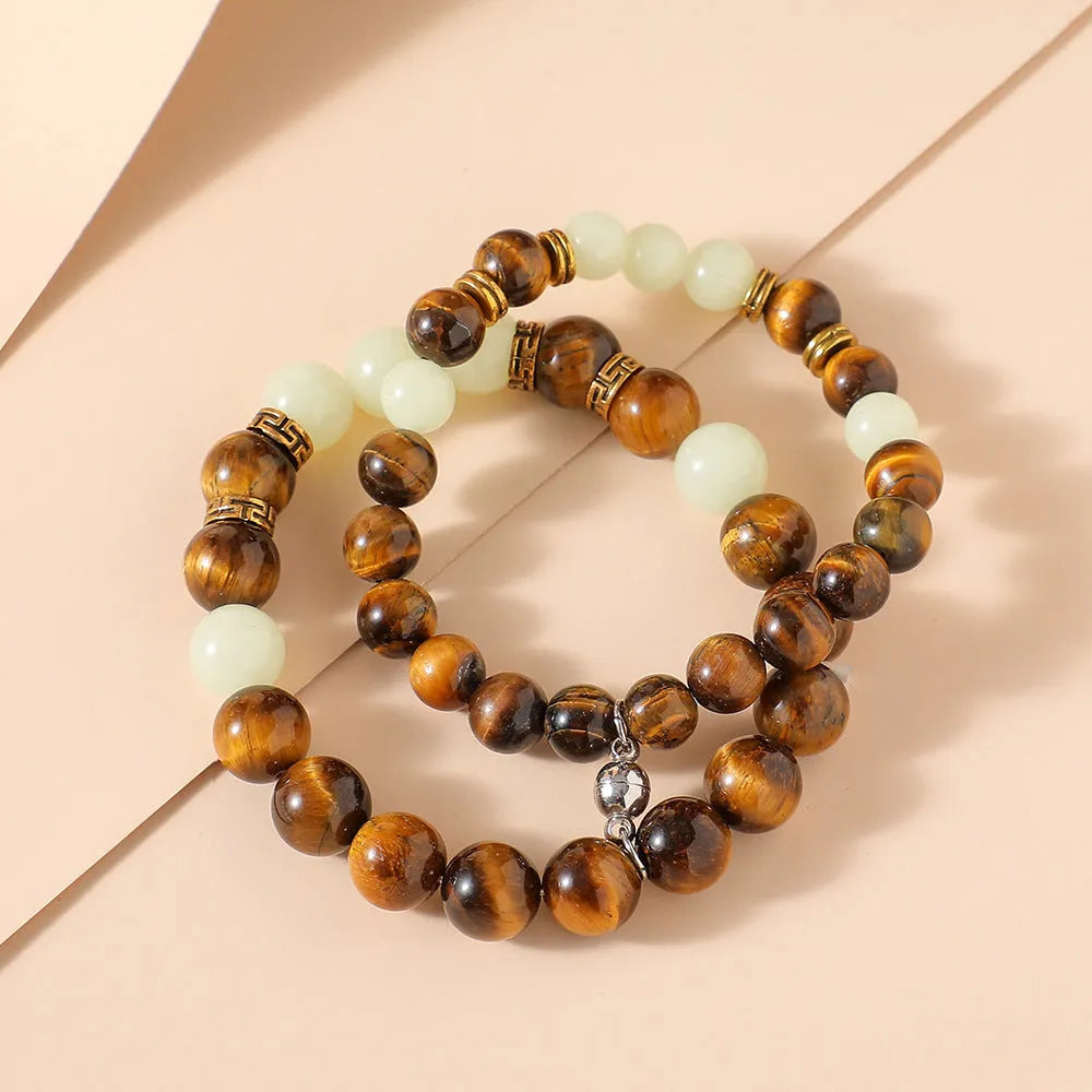 Amber couple bracelet set with geometric patterns in retro style