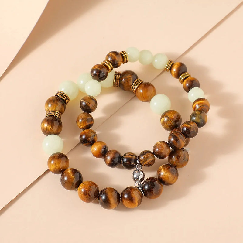 Couple bracelet set for matching partners featuring retro European and American fashion style with luminous amber colour and simple geometric patterns in a minimalist design.