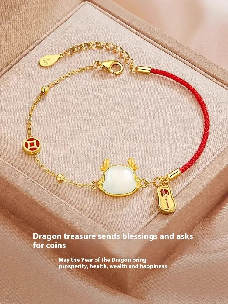Silver-plated dragon zodiac bracelet for women with Hetian jade accents on a white background.