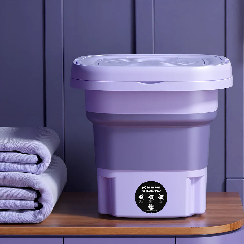 Green folding washing machine measuring 26x26x27cm with USB power cable and mechanical dial controls