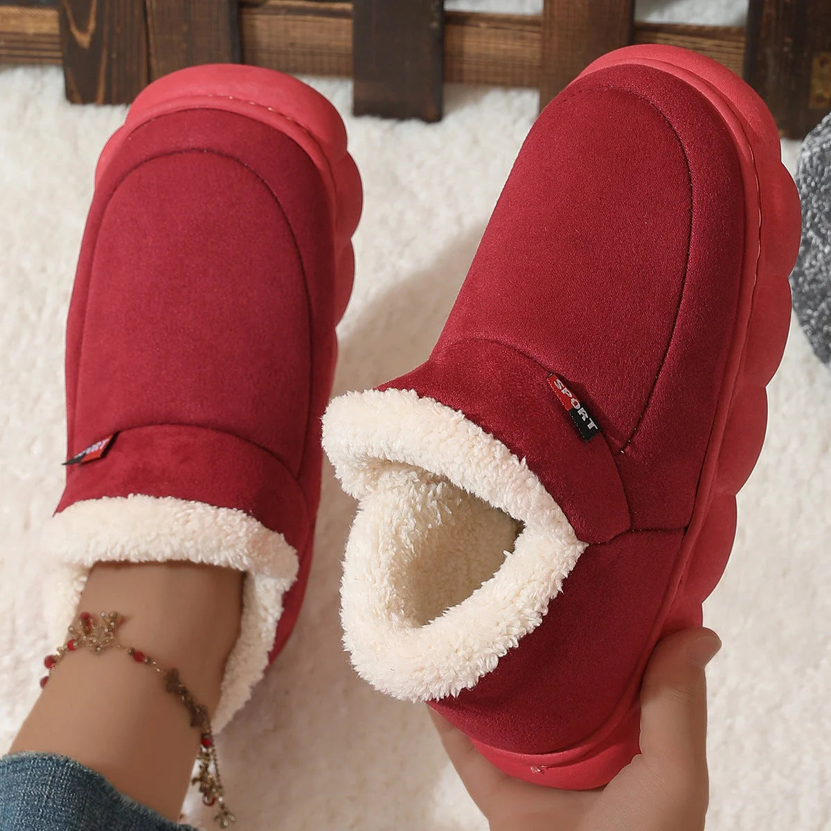 Cosy velvet house slippers for men and women, featuring plush velvet upper, suede lining, and durable rubber soles