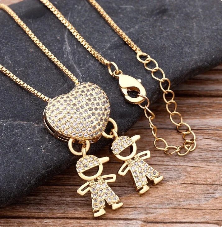 Gold cubic zirconia heart pendant necklace for mothers, symbolising family love.