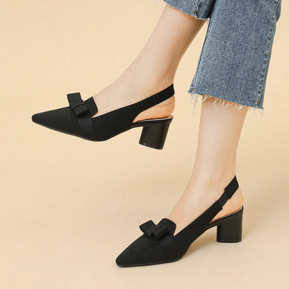 Women's closed toe high heel sandals with back strap and decorative bow in fabric uppers