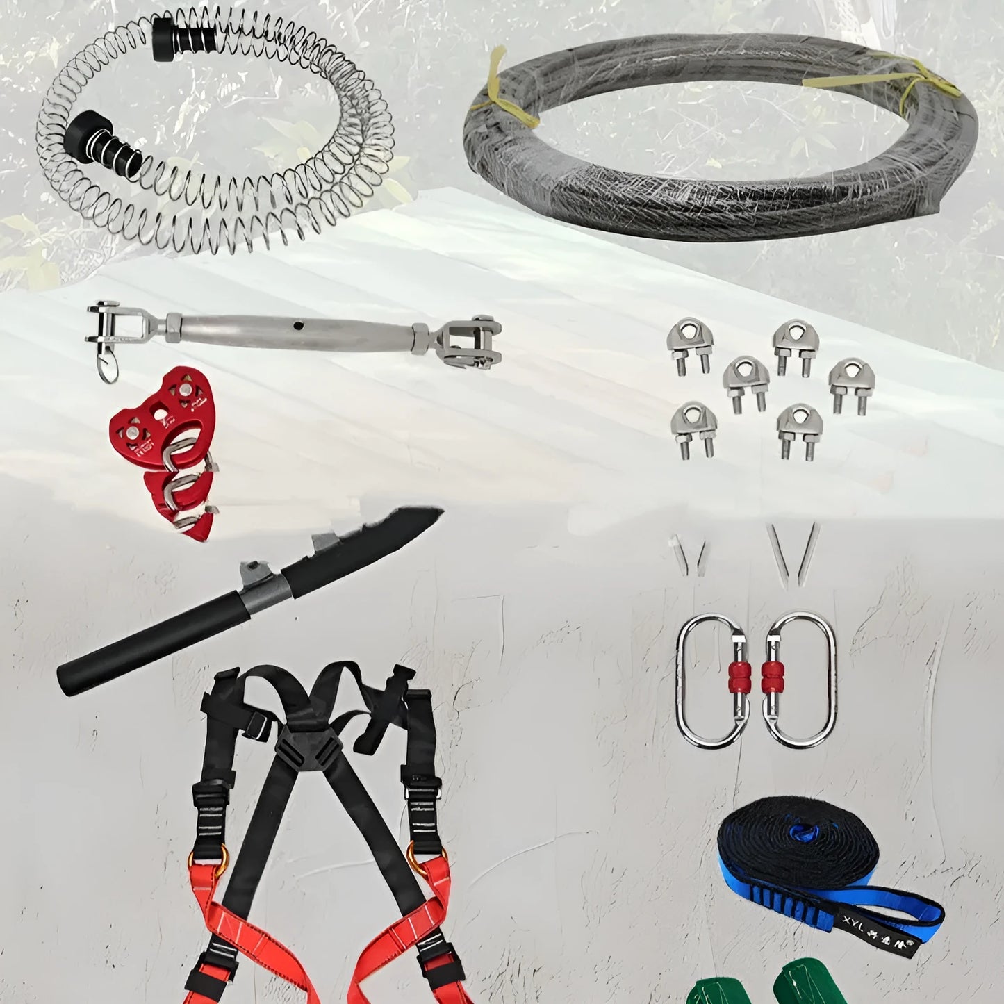 XYL Ziptreck 10-metre pulley slide rope set with handle, safety retractor, and multiple alloy steel locks laid out.