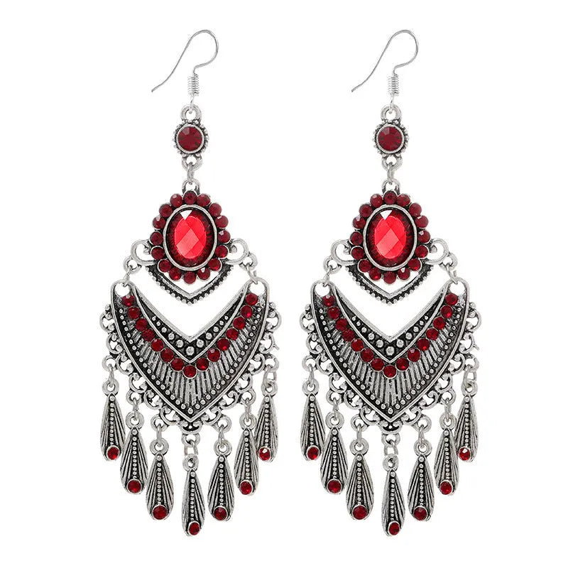 Purple drop-shaped alloy earrings with long fringe and crystal details on a retro style.