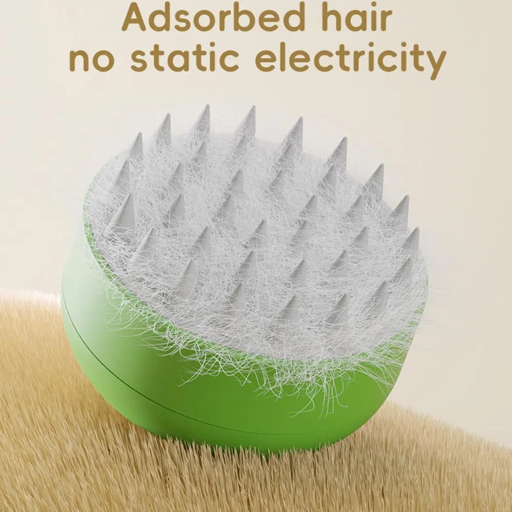 Green and yellow rechargeable cat steam brush with silicon bristles, measuring 85x85x52mm