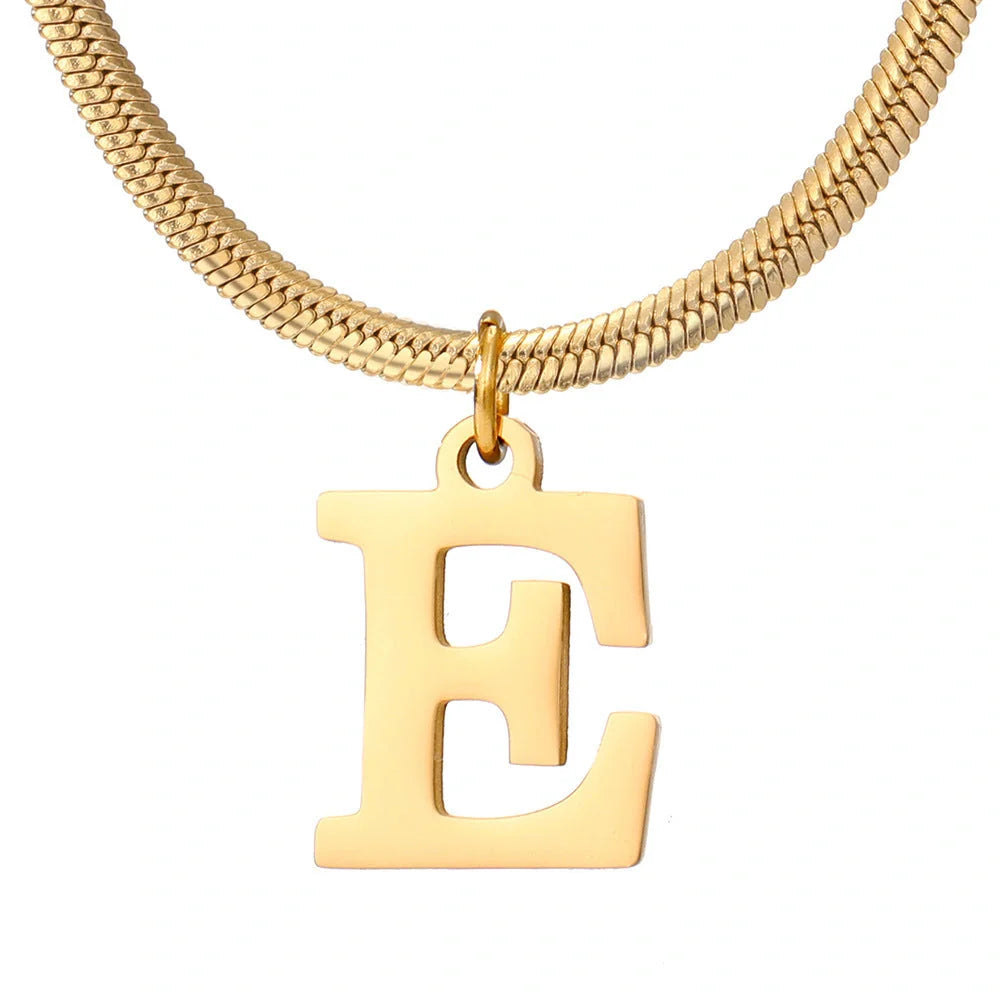 Elegant gold A-Z letter pendant necklace on a snake chain