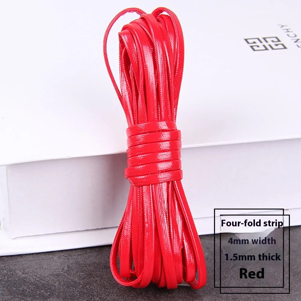 Coiled reels of PU leather craft string in multiple colours including beige, black, red, and blue.