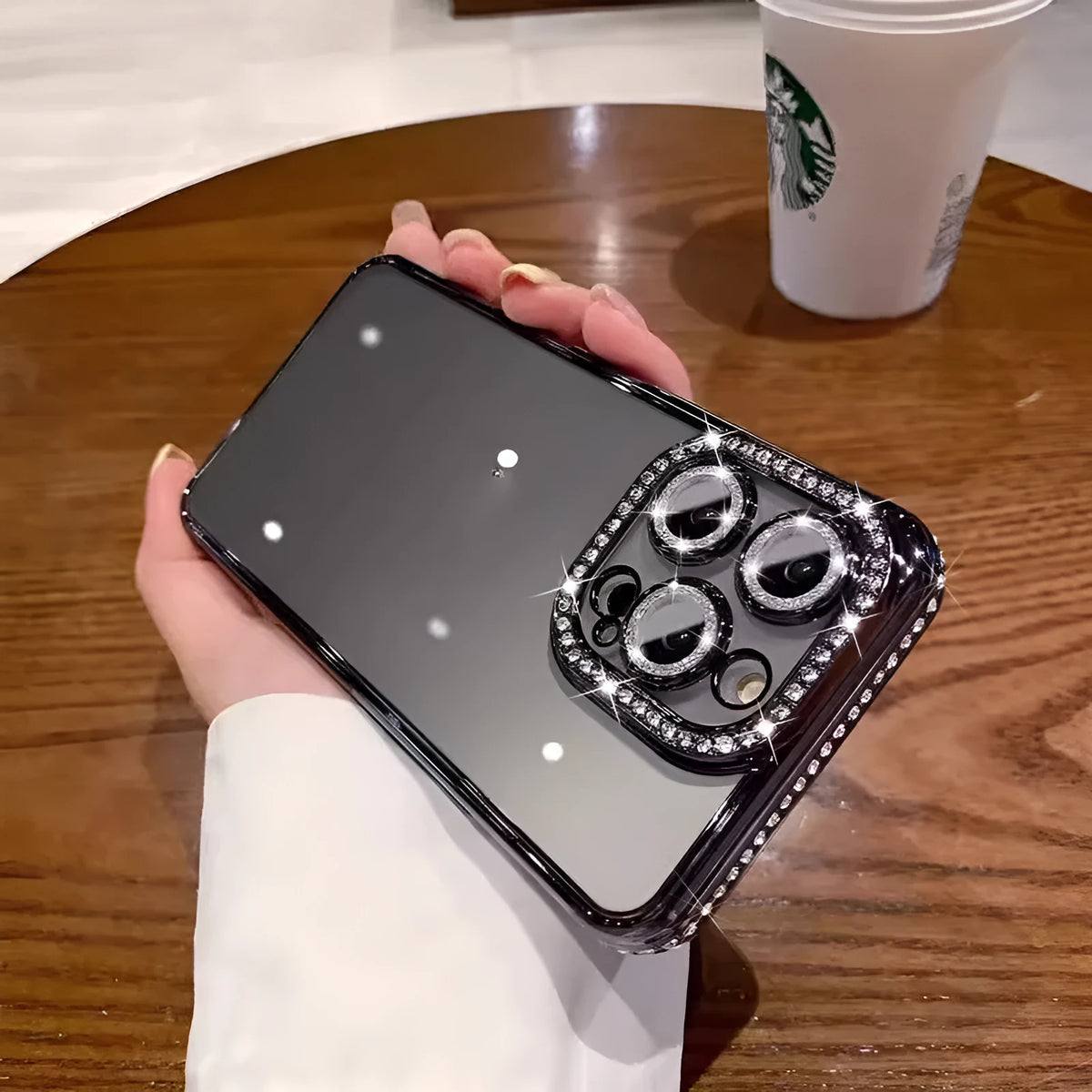 Rhinestone glitter TPU phone case with lens protector, compatible with iPhone 11 to 15 Pro Max, available in black, dark purple, gold, pink, silver and blue.