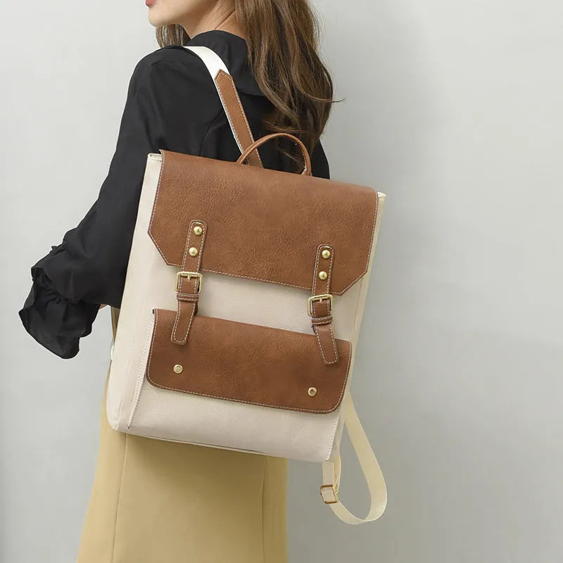 Korean style retro simple backpack with PU material and soft construction, featuring ventilation and burden reduction functions for comfortable daily use across four colour options.