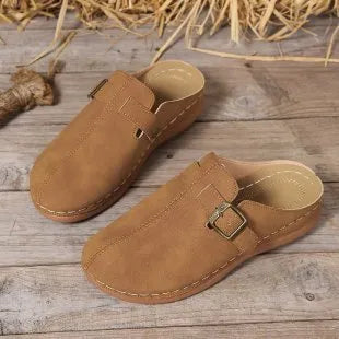 Women's casual wedge slippers in cloth with a rubber sole, shown in light brown colour.