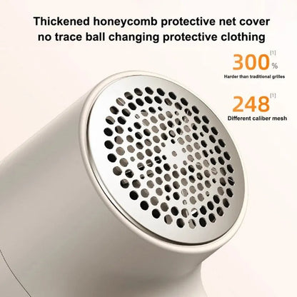 White electric lint remover with digital display showing six stainless steel blades and USB charging port