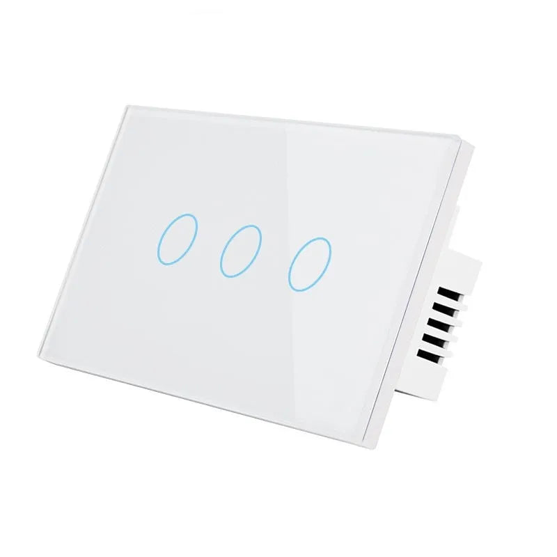 White tempered glass smart touch light switch with blue LED indicator on a UK wall.