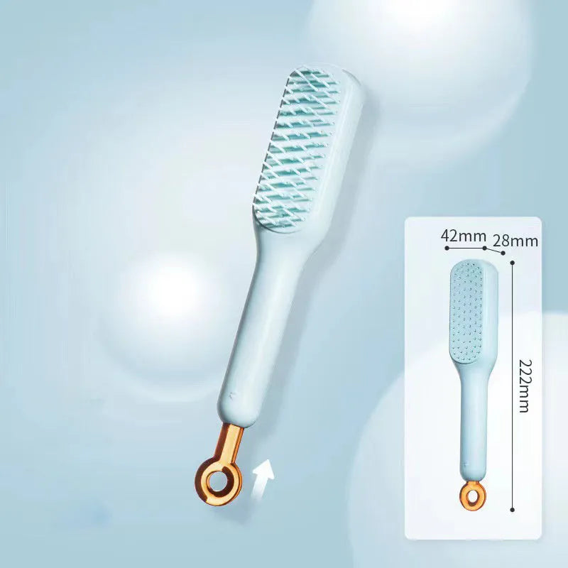 Dual-sided small dog grooming brush showing pin brush and soft bristle brush sides, in blue colour.