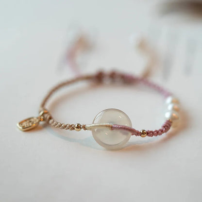 Ethnic style crystal bracelet with vintage woven strap and chamfered square grain details