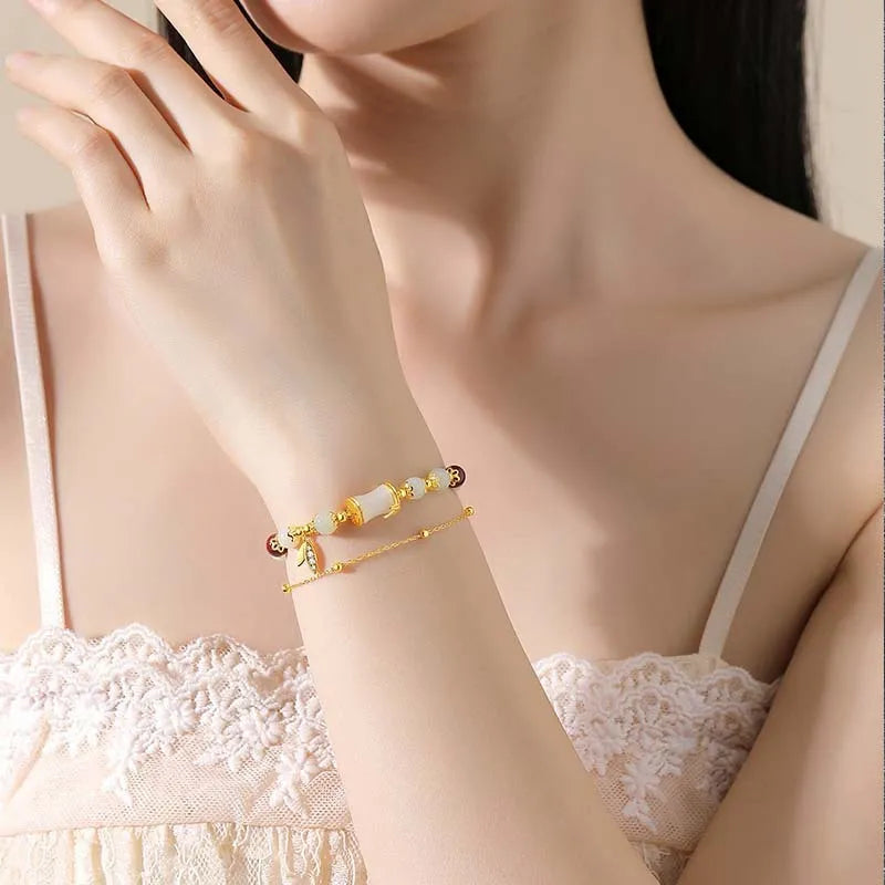 Retro bamboo design bracelet with floral shape and ruyi element in glass and coloured glaze