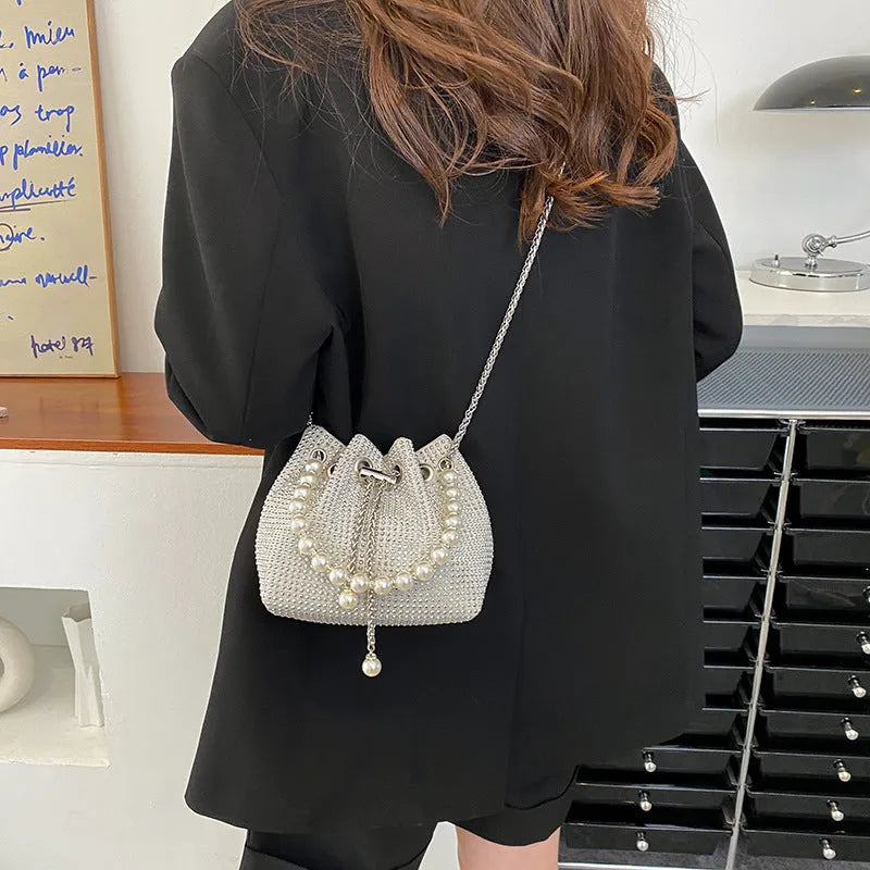 Diamond-patterned soft PU shoulder bag with detachable chain strap in bucket shape with internal organisers