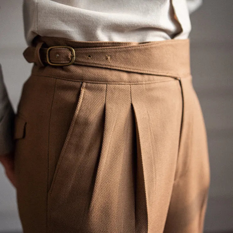 Men's high waist straight leg casual trousers in black, shown laid flat.