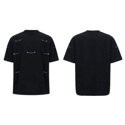 Black men's t-shirt with metal chain and padded shoulder detail on a short sleeve cotton-polyester blend.