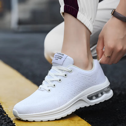 Casual Flyknit running shoes in multiple colours with mesh uppers and a round toe design.