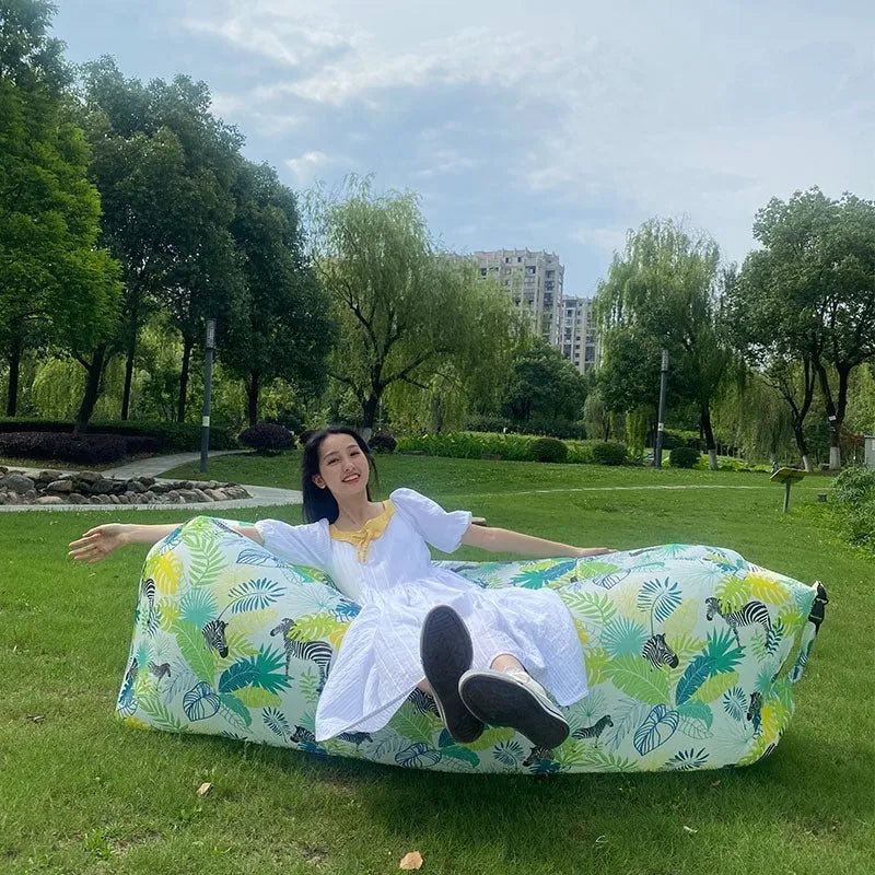 Yellow smiling face pattern inflatable portable seat for outdoor use
