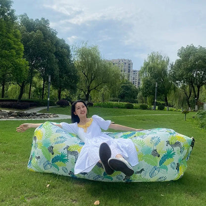 Yellow smiling face pattern inflatable portable seat for outdoor use