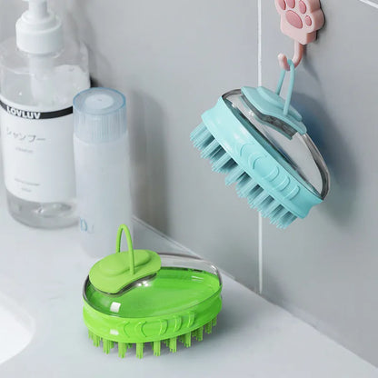 Blue and green pet bath brushes with soft TPR bristles and plastic handles for dog grooming