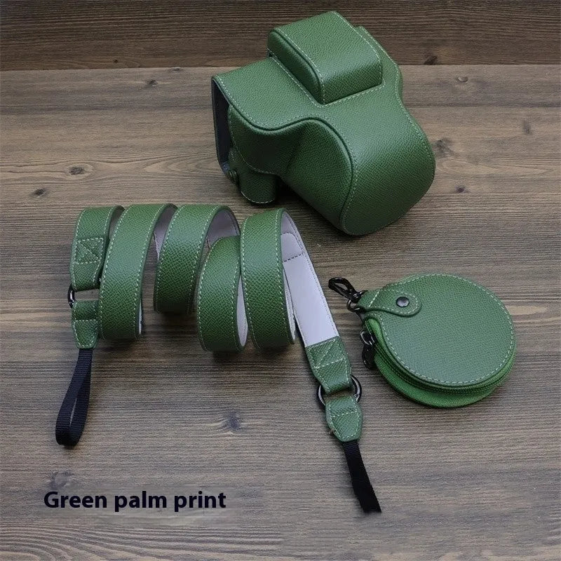 PU shoulder bag for a single mirrorless camera, shown in oil skin or palm print finish