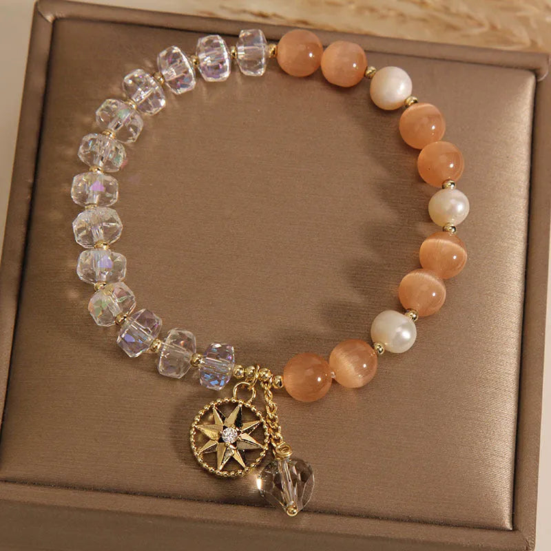 Orange eight Awn star bracelet with gold-plated inlay and artificial gemstones