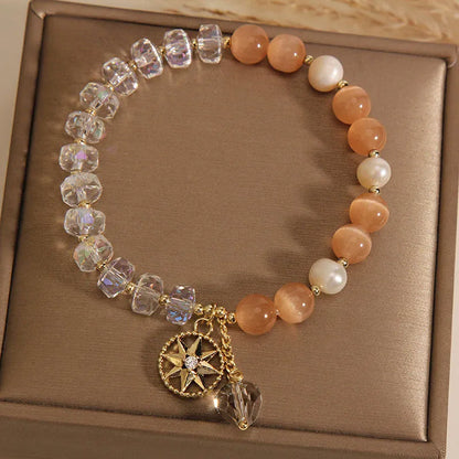 Orange eight Awn star bracelet with gold-plated inlay and artificial gemstones