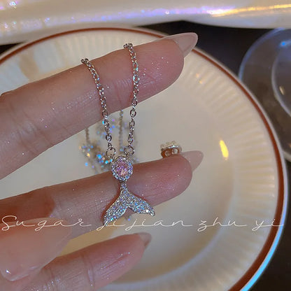 Women's sterling silver necklace with geometric fishtail pendant on adjustable O-ring chain