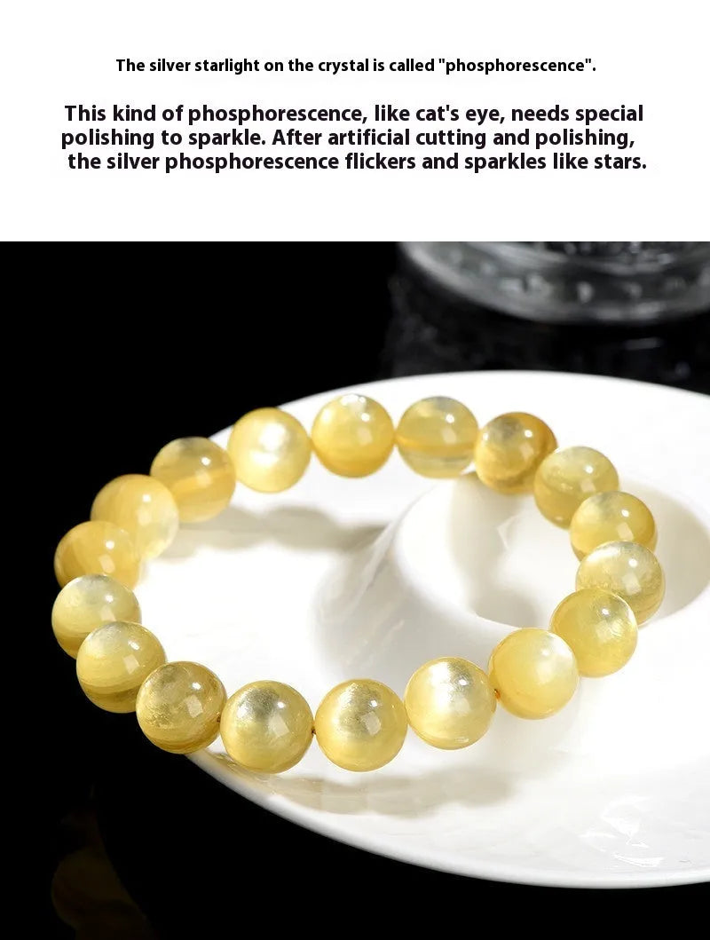 Yellow golden dragon mica round beads bracelet with polished geometric beads on a string.