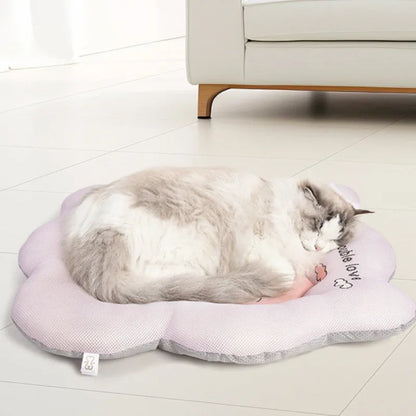 Ice silk pet cooling mat in green and pink colours showing four size options for dogs and cats