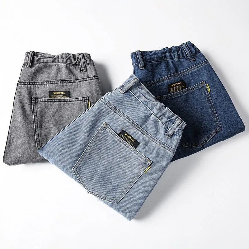 Men's loose straight jeans in dark blue colour showing relaxed fit and traditional styling