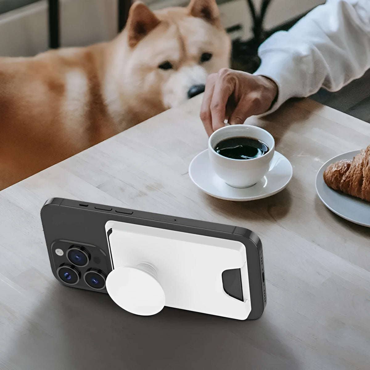 Minimalist magnetic suction phone airbag holder in black for compatible iPhone office use