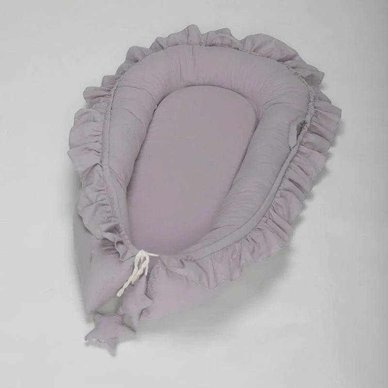 Lace Cotton Baby Bionic Bed Portable in pink, blue, purple, and beige