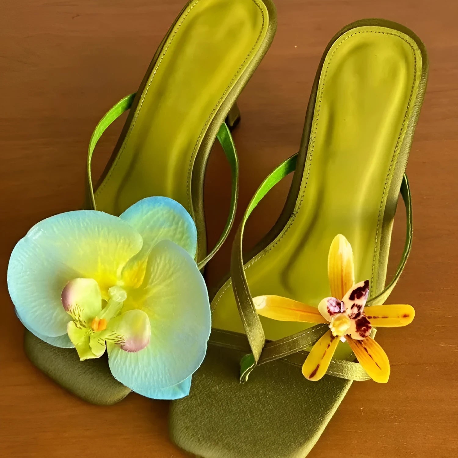 Women's handmade asymmetric flower high heel sandals in black, green, pink, or white on a calf leather upper with EVA sole.