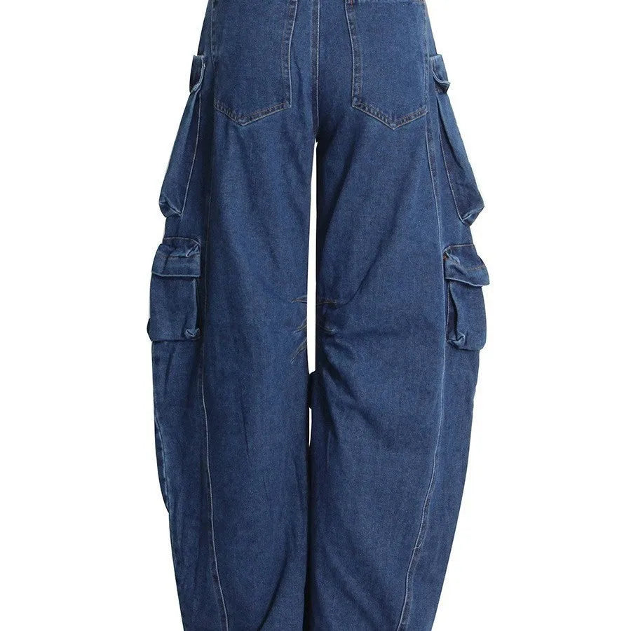 Dark blue distressed wide-leg women's jeans with high waist and multiple pockets on cotton denim fabric