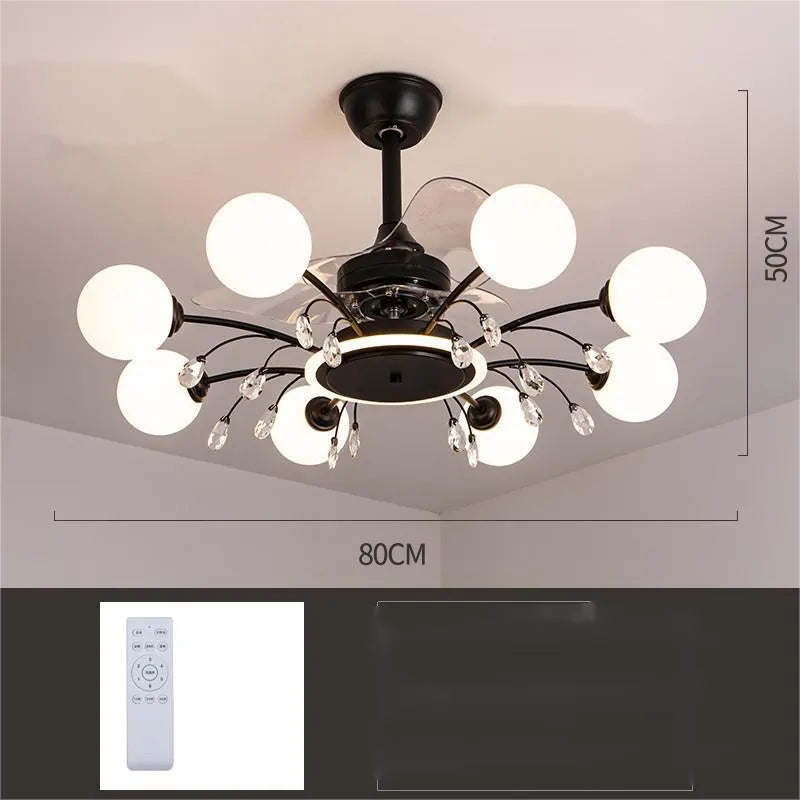 Black and gold ceiling fan lamp with acrylic shade and metal blades, shown with remote control.