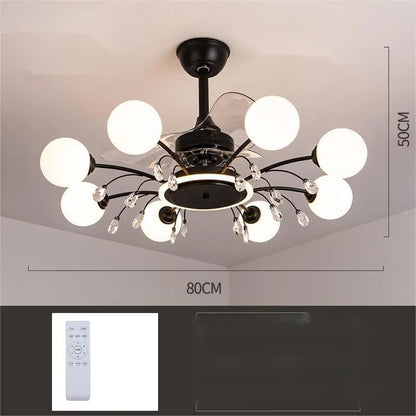 Black and gold ceiling fan lamp with acrylic shade and metal blades, shown with remote control.