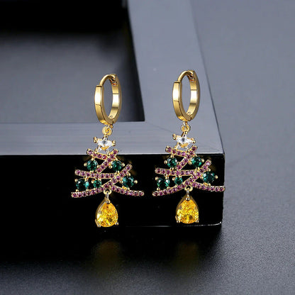 Shimmering gold Christmas tree earrings with colorful rhinestones, a must-have holiday fashion accessory