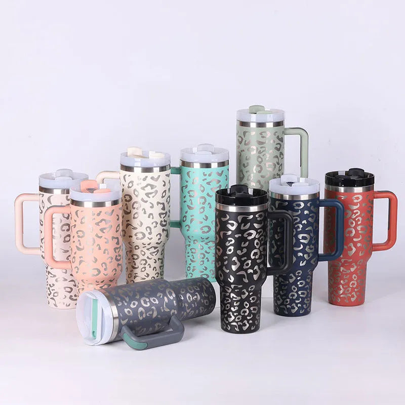 40oz stainless steel tumbler with handle and straw in various colour options showing tapered shape and spill-proof lid