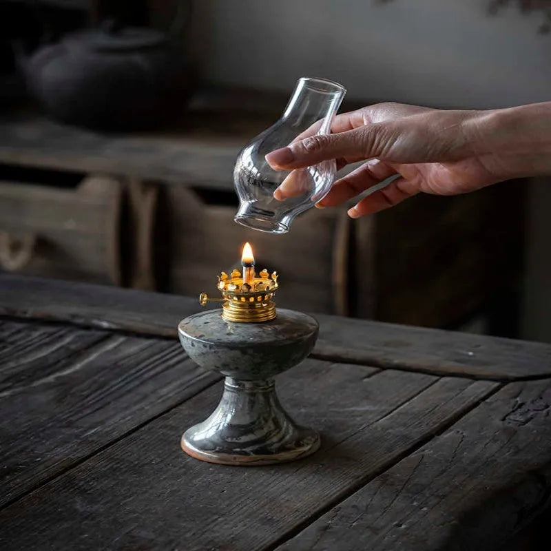 Black handmade ceramic kerosene lamp night light with retro split design, 23.8cm tall and 7.8cm wide