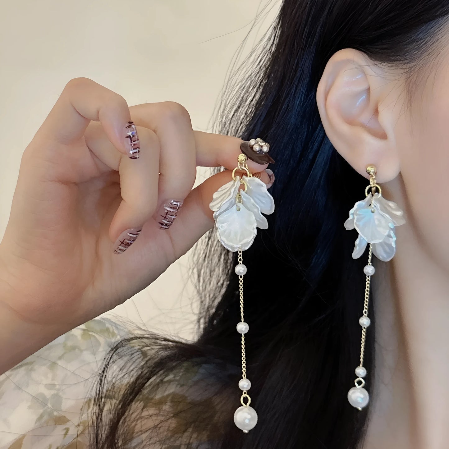 Women's acrylic shell pearl tassel earrings showing four ear clip types and casual style design