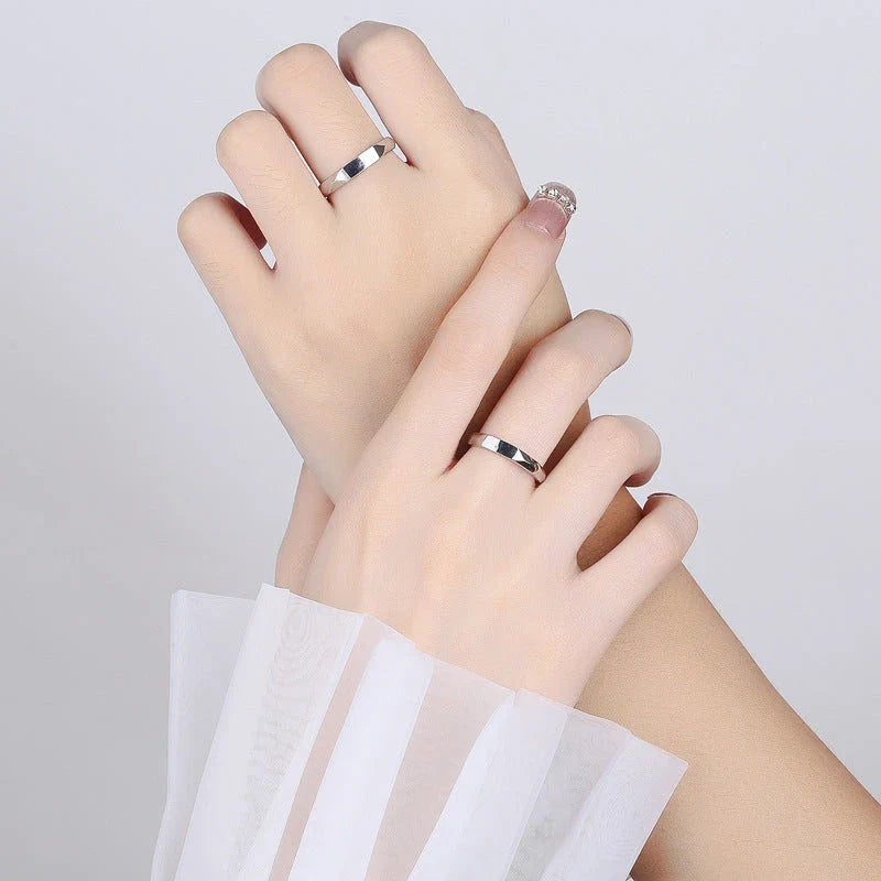 Elegant S925 sterling silver rings with a hidden love pattern design, adjustable sizing for a personalized fit.