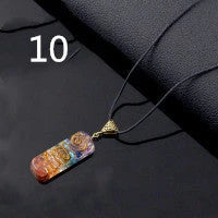 Handcrafted natural crystal seven chakra pendant with unique geometric design
