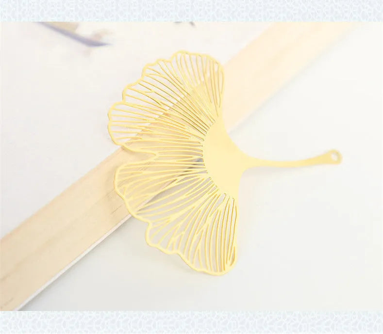 Brass metal bookmark with hollow plating leaf design and rose gold tassel decoration