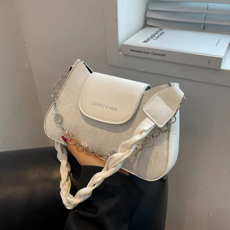 Women's PU underarm shoulder bag in black or beige, 24cm wide, 15cm high, 6cm thick, with 29cm handle.